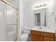 Updated bathroom with glass shower and vanity with storage at 3242 Monarch Pine Dr, Peachtree Corners, GA 30071