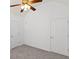 This bedroom is carpeted and features a ceiling fan and white walls at 3242 Monarch Pine Dr, Peachtree Corners, GA 30071
