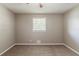 Neutral bedroom with carpet, a ceiling fan, and window bringing in ample natural light at 4447 Ben Hill Rd, Lithia Springs, GA 30122