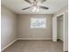 Bedroom featuring neutral paint, carpet, and a closet for optimal storage at 4447 Ben Hill Rd, Lithia Springs, GA 30122