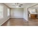 Inviting living room with hardwood floors, neutral walls, and an open concept layout at 4447 Ben Hill Rd, Lithia Springs, GA 30122