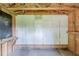 Exposed interior beams accent the open space within the shed at 4447 Ben Hill Rd, Lithia Springs, GA 30122