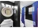 Bathroom features black walls, a modern sink, and a bathtub with blue curtains at 4467 Pineridge Cir, Atlanta, GA 30338