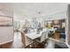 Elegant dining room with hardwood flooring, decorative mirror, and clear view into the cozy living area at 4467 Pineridge Cir, Atlanta, GA 30338