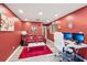Living room features a modern table, a leather sofa, and red decor at 4467 Pineridge Cir, Atlanta, GA 30338