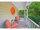 Inviting front porch featuring cozy seating, providing a perfect space for relaxation and enjoyment of the outdoors at 4467 Pineridge Cir, Atlanta, GA 30338