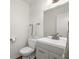 Powder room with contemporary vanity, fixtures, and flooring at 834 Heritage Sq, Decatur, GA 30033