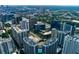 City view featuring rooftops of building with community pool and lush landscaping at 950 Nw W Peachtree Nw St # 410, Atlanta, GA 30309