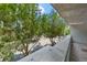 Balcony view overlooking trees and cityscape at 950 Nw W Peachtree Nw St # 410, Atlanta, GA 30309