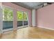 Bright bedroom boasts natural light with an attached balcony at 950 Nw W Peachtree Nw St # 410, Atlanta, GA 30309