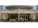 Welcoming entrance to 950 West Peachtree St NW with covered entry and glass doors at 950 Nw W Peachtree Nw St # 410, Atlanta, GA 30309
