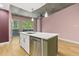 Modern kitchen island with stainless steel dishwasher at 950 Nw W Peachtree Nw St # 410, Atlanta, GA 30309