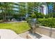 Outdoor grill area with well-maintained landscaping and comfortable dining area at 950 Nw W Peachtree Nw St # 410, Atlanta, GA 30309