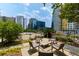 Outdoor lounge area with comfortable seating and views of the city skyline at 950 Nw W Peachtree Nw St # 410, Atlanta, GA 30309