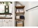 Bathroom shelving with towels and toiletries for storage at 1175 Haven Brook Way, Atlanta, GA 30319