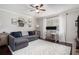 Cozy living room features a pull-out sofa and a dedicated workspace at 1175 Haven Brook Way, Atlanta, GA 30319