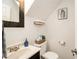 Powder room with a modern sink and decorative mirror at 1175 Haven Brook Way, Atlanta, GA 30319