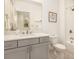 Modern bathroom with gray cabinets, white quartz countertop, and white tile shower at 1216 Virginia Ne Ct # 8, Atlanta, GA 30306