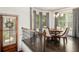 Elegant dining room featuring a hardwood floors, bay window, and stylish chandelier at 1216 Virginia Ne Ct # 8, Atlanta, GA 30306