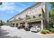 Exterior shot showcasing townhomes with private garages and second-story decks at 1216 Virginia Ne Ct # 8, Atlanta, GA 30306