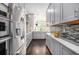 Modern kitchen with stainless steel appliances, sleek cabinets, and stylish backsplash at 1216 Virginia Ne Ct # 8, Atlanta, GA 30306