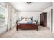 Spacious main bedroom with large windows, plush carpet, and elegant furnishings at 1216 Virginia Ne Ct # 8, Atlanta, GA 30306