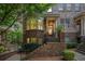 Charming brick townhouse with bay window and inviting entryway showcasing curb appeal at 1216 Virginia Ne Ct # 8, Atlanta, GA 30306