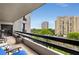 This comfortable balcony sitting area has great views of the city and surrounding green spaces at 2660 Peachtree Nw Rd # 10H, Atlanta, GA 30305