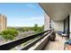 Enjoy the lush tree coverage and views from this unit's private balcony with comfortable seating at 2660 Peachtree Nw Rd # 10H, Atlanta, GA 30305