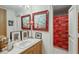 Bathroom with vanity, decorative art, and bright shower with patterned curtains at 2660 Peachtree Nw Rd # 10H, Atlanta, GA 30305