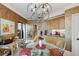 Comfortable dining area featuring modern lighting and access to great views at 2660 Peachtree Nw Rd # 10H, Atlanta, GA 30305
