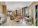 Dining area with modern light fixture and big windows providing city views at 2660 Peachtree Nw Rd # 10H, Atlanta, GA 30305