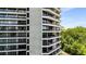 Exterior shot of this high rise building showcasing views from multiple private balconies at 2660 Peachtree Nw Rd # 10H, Atlanta, GA 30305