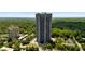 Exterior of a luxurious high-rise building, surrounded by lush greenery and city views at 2660 Peachtree Nw Rd # 10H, Atlanta, GA 30305