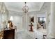 Elegant foyer features marble floors, decorative lighting, and an open view into the living space at 2660 Peachtree Nw Rd # 10H, Atlanta, GA 30305
