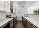 Modern kitchen with sleek countertops, stainless steel appliances, and ample cabinet space, perfect for cooking at 2660 Peachtree Nw Rd # 10H, Atlanta, GA 30305