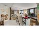 Bright living room features floor-to-ceiling windows with great views and comfortable seating areas at 2660 Peachtree Nw Rd # 10H, Atlanta, GA 30305