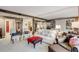Spacious living room with plenty of seating options and lots of natural light at 2660 Peachtree Nw Rd # 10H, Atlanta, GA 30305