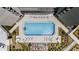 Top-down view of the rectangular outdoor pool with a sundeck and lounge chairs for relaxation at 2660 Peachtree Nw Rd # 10H, Atlanta, GA 30305