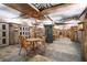 Unique wine cellar with stone floors, painted ceilings, and custom storage, creating a distinct space at 2660 Peachtree Nw Rd # 10H, Atlanta, GA 30305
