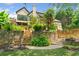 Multi-level backyard showcases stone retaining walls, garden beds and stone staircase at 3770 Riverly Trce, Marietta, GA 30067