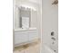 This bathroom features a shower and sink with white cabinets at 3770 Riverly Trce, Marietta, GA 30067