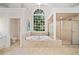 Relaxing bathroom featuring large soaking tub and walk-in shower at 3770 Riverly Trce, Marietta, GA 30067