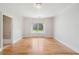 Spacious bedroom showcasing hardwood floors and a large window at 3770 Riverly Trce, Marietta, GA 30067