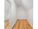 A walk-in closet features wood floors and ample storage space at 3770 Riverly Trce, Marietta, GA 30067