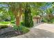 Well-manicured front yard and landscaping with a three-car garage and elegant exterior finishes at 3770 Riverly Trce, Marietta, GA 30067