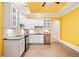A colorful kitchen features granite counters, stainless appliances, and ample cabinet space at 3770 Riverly Trce, Marietta, GA 30067