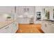 Well-appointed kitchen with white cabinetry, granite countertops, and stainless steel appliances at 3770 Riverly Trce, Marietta, GA 30067