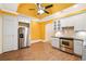 A colorful kitchen features stainless appliances, granite counters, and ample cabinet space at 3770 Riverly Trce, Marietta, GA 30067