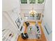 Bright living room with hardwood floors, fireplace, and large windows that offer plenty of natural light at 3770 Riverly Trce, Marietta, GA 30067